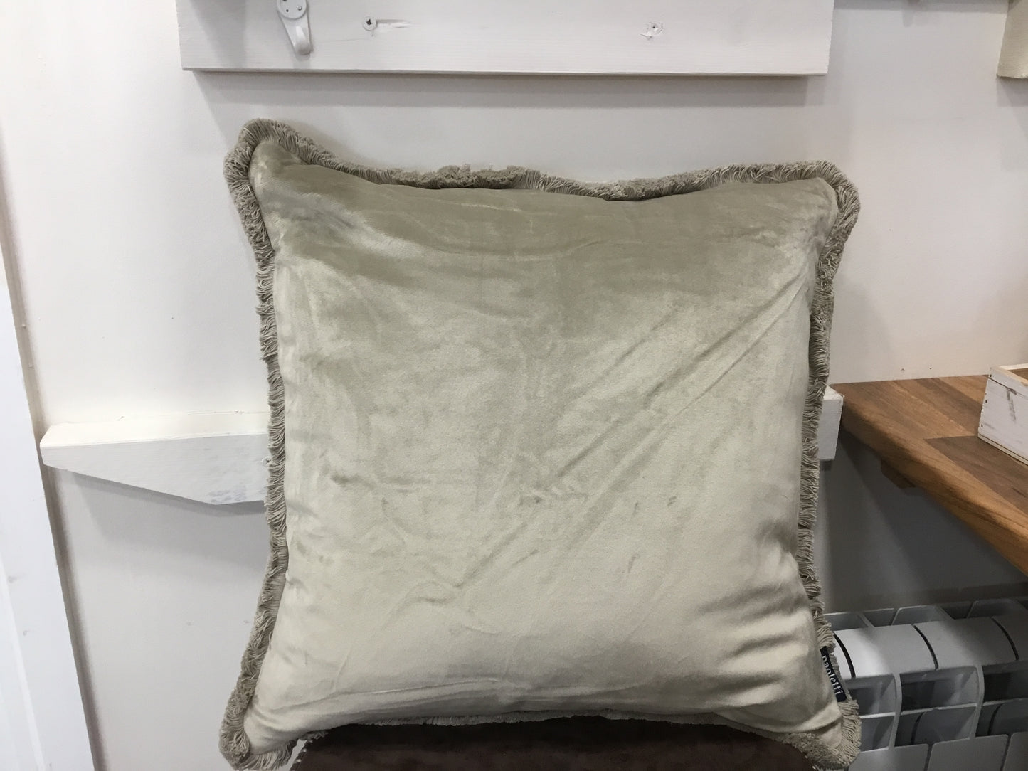 Taupe velvet cushion