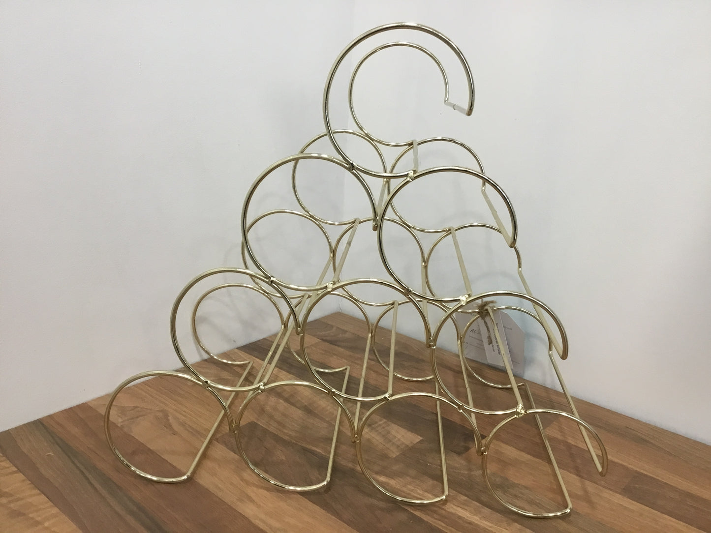 Gold wine bottle stand