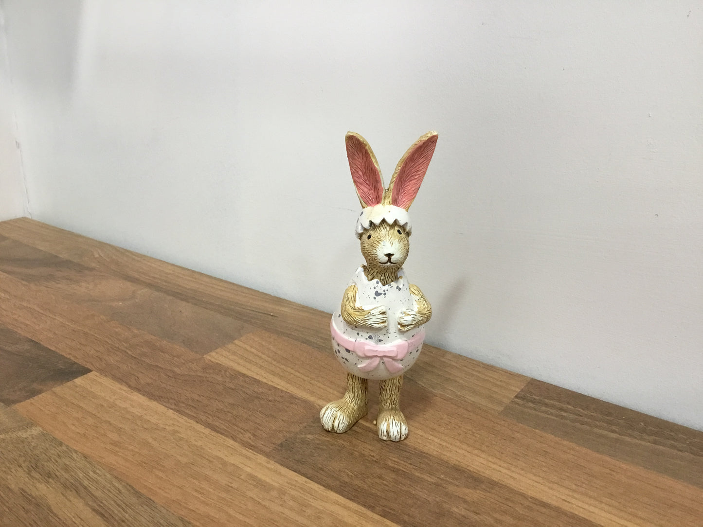 Bunny in egg costume with pink bow