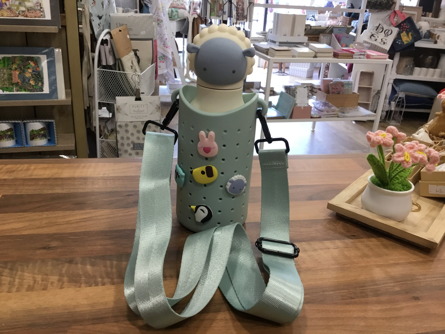Asobu Bestie Bottle sling bag with removable charms