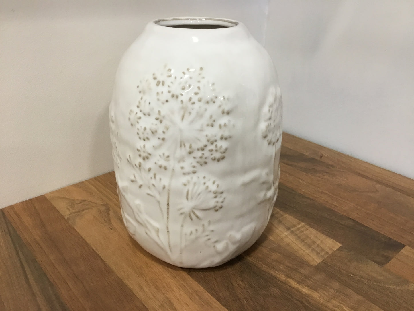 Floral embossed vase