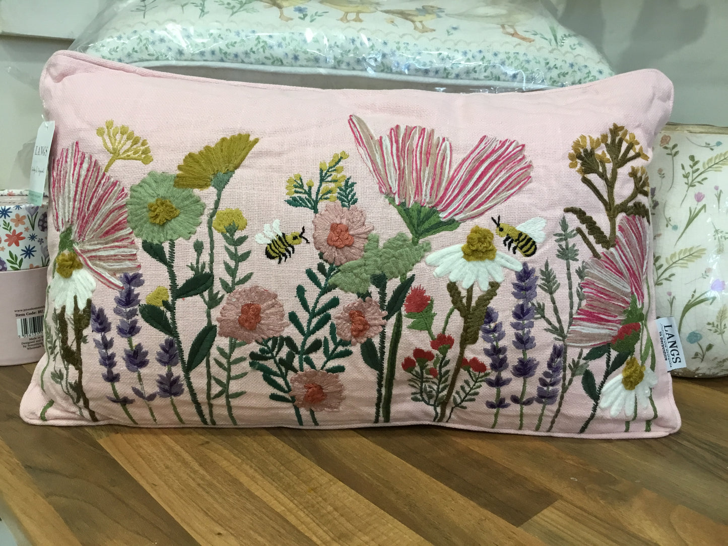Pink embroidered cushion