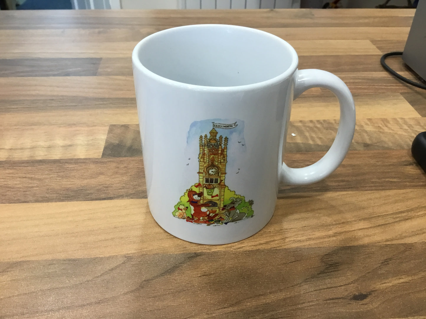 Kenilworth. Dogs at the clock