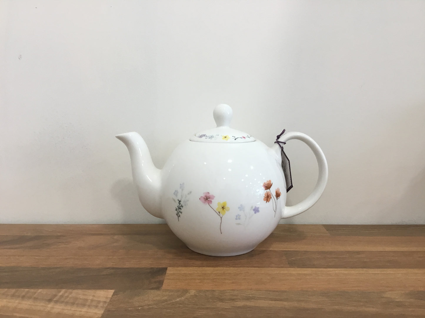 Ceramic pressed flowers design teapot