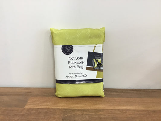 Not on sofa tote bag