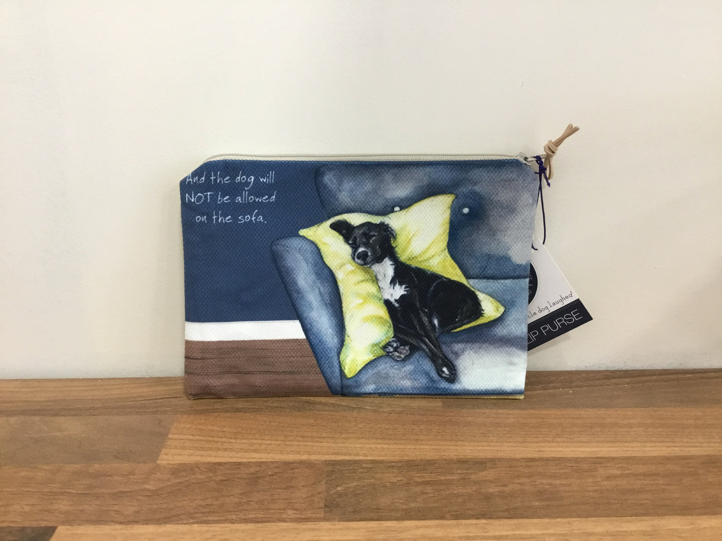 Dog on sofa purse