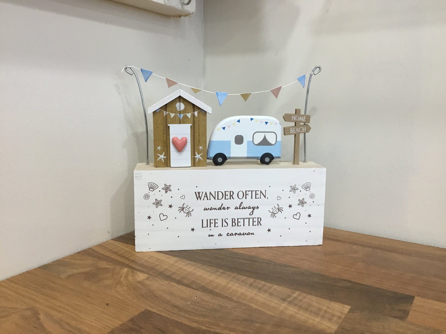 Wooden ornament. Beach hut and caravan.