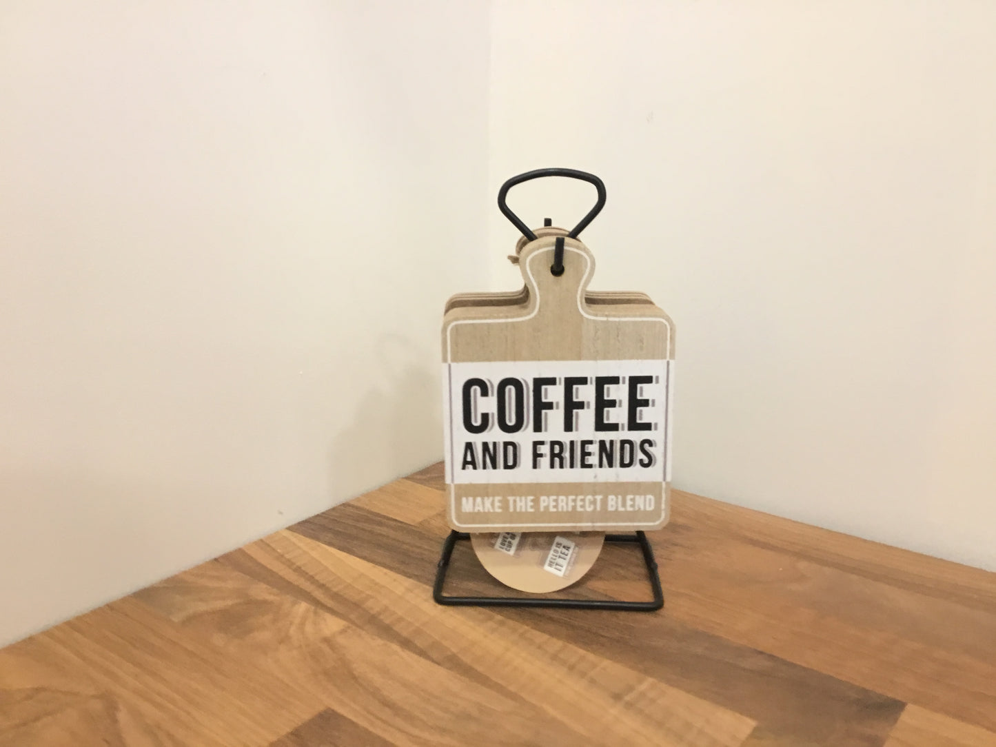 Coffee coasters on black stand