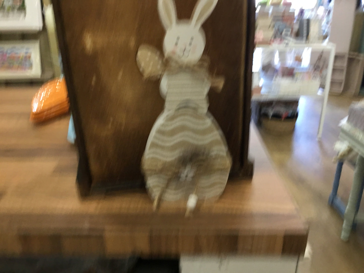 Wooden rabbit on egg.