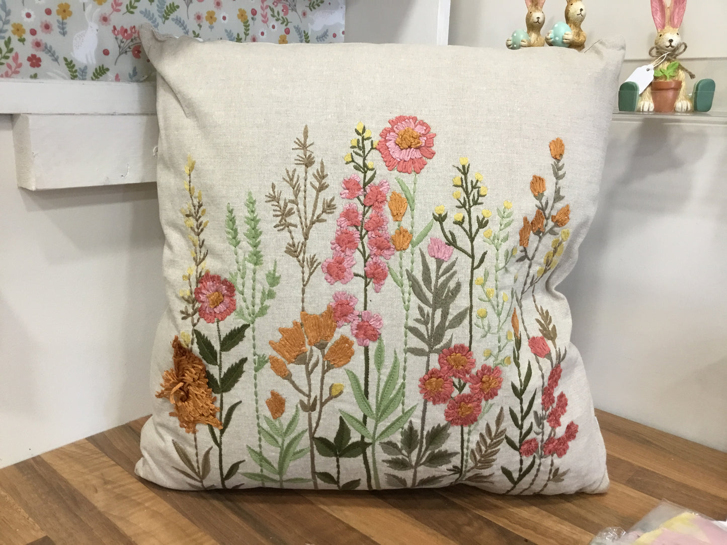 Embroidered floral cushion