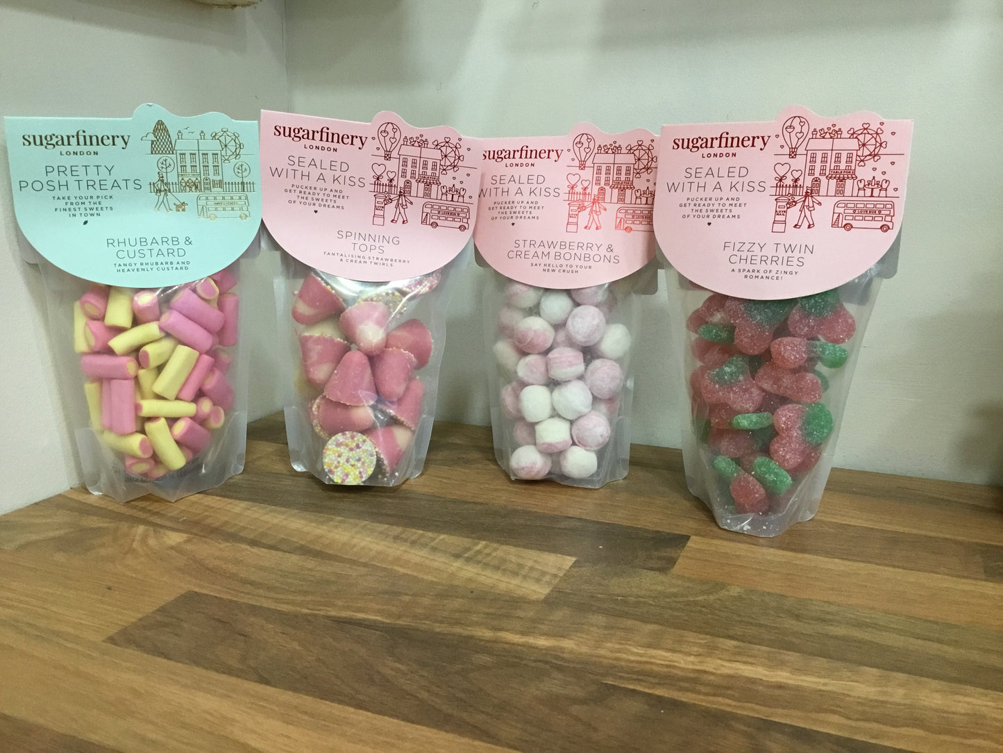 Sweets. Fizzy cherries. Rhubarb & Custard. Bonbons. Spinning tops.
