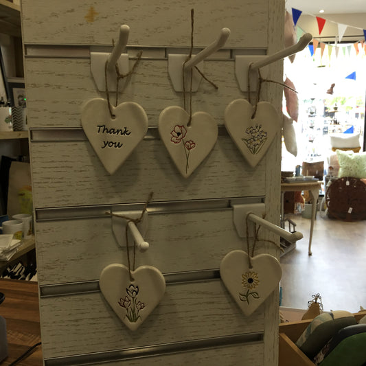 Ceramic hearts with flowers. Ceramic heart thank you.