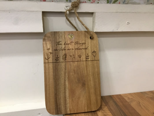Wooden board. “ The best things in life are shared”