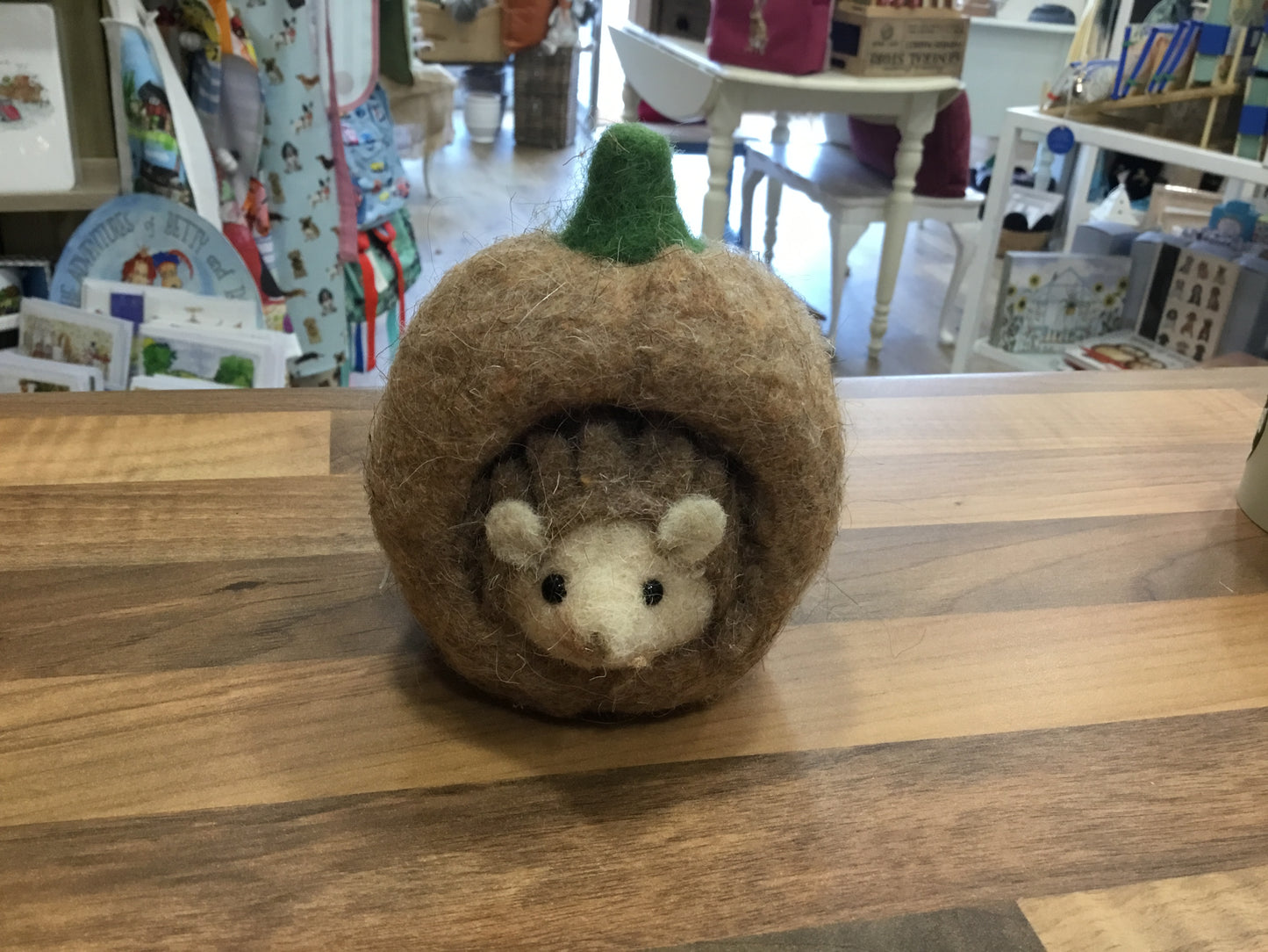 Felt hedgehog in acorn
