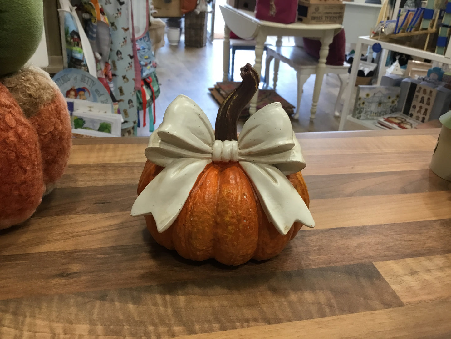 Large pumpkin with white bow