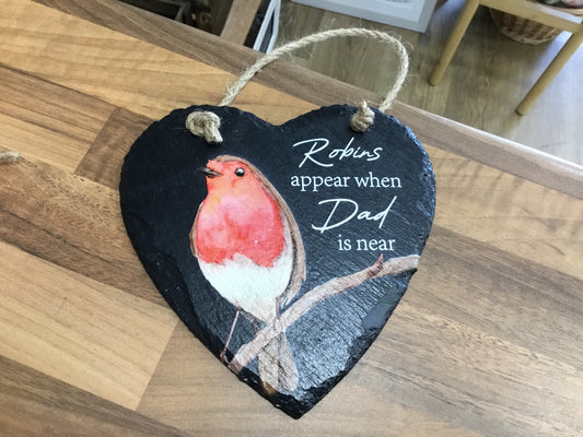 Robins appear when Dad is near slate plaque