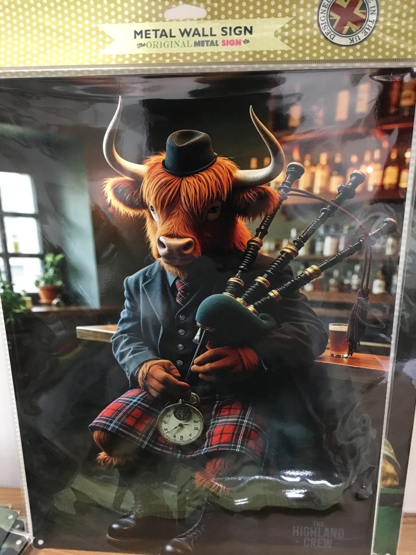 Highland Cow with bagpipes