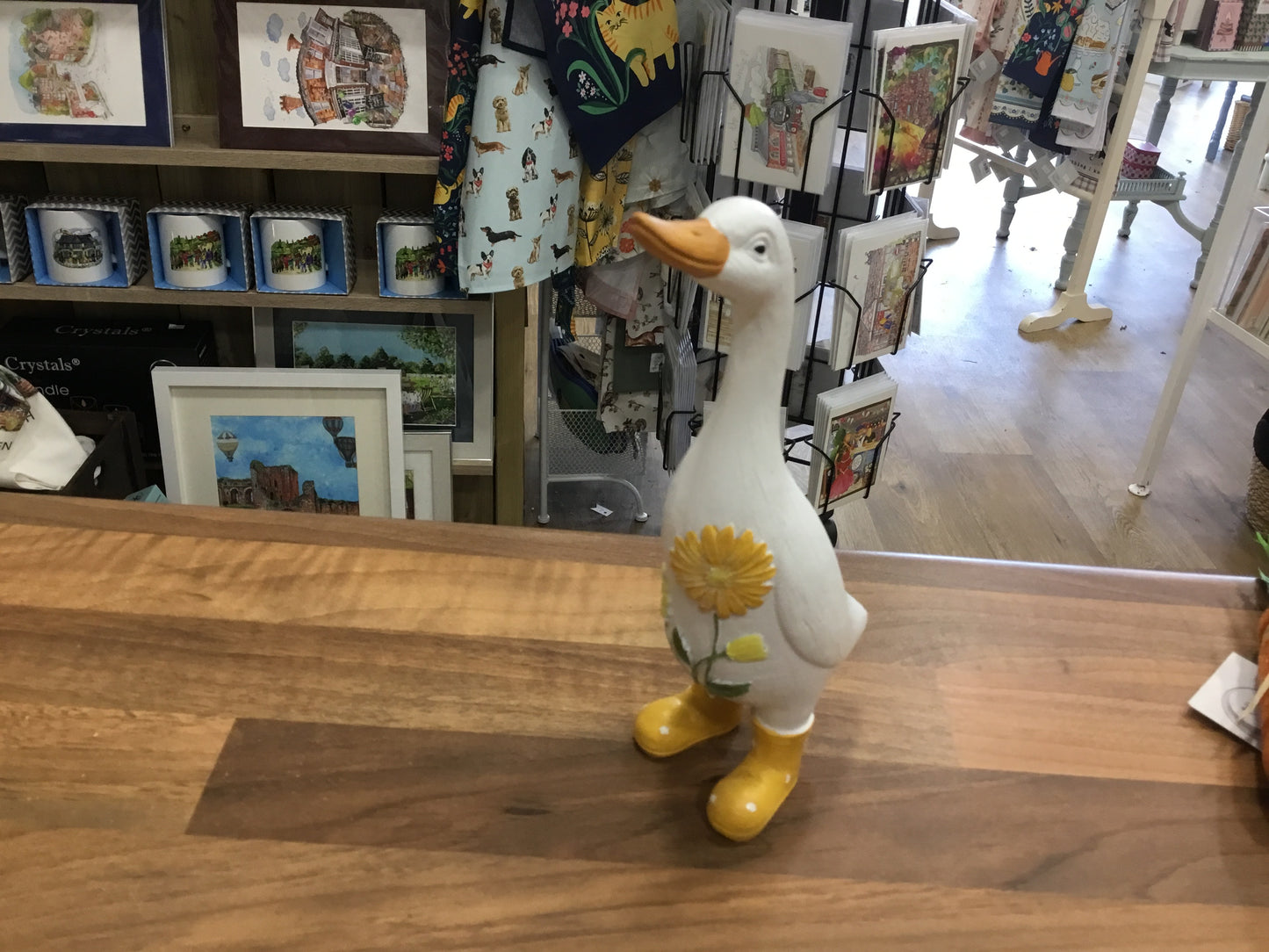 White painted duck in yellow wellies