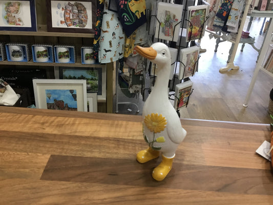 White painted duck in yellow wellies