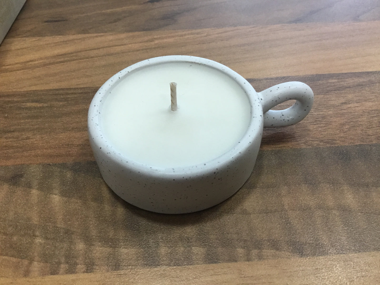 Candle in ceramic holder