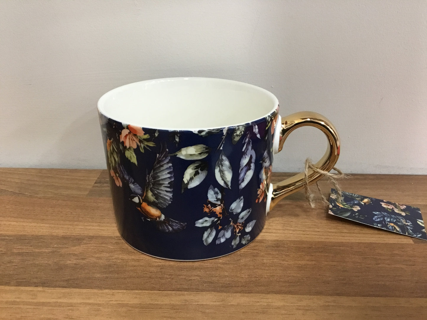 Bird mug with gold handle