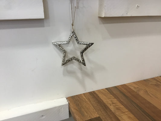 Small hanging silver coloured star