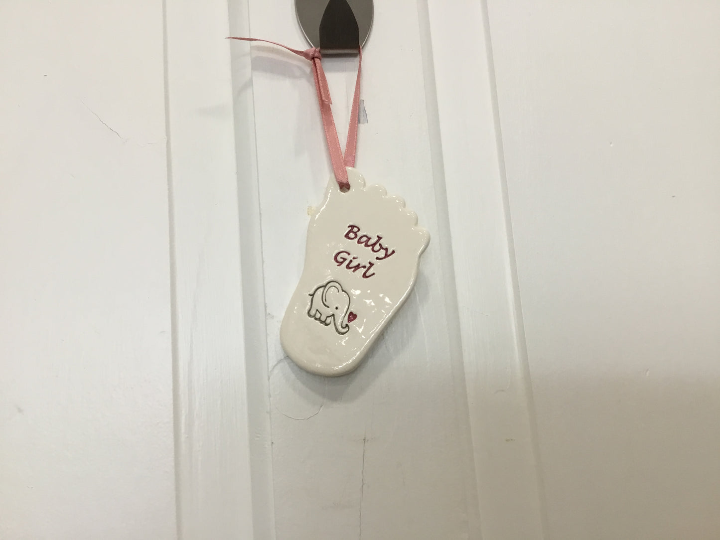 Ceramic baby girl foot. Ceramic new baby foot