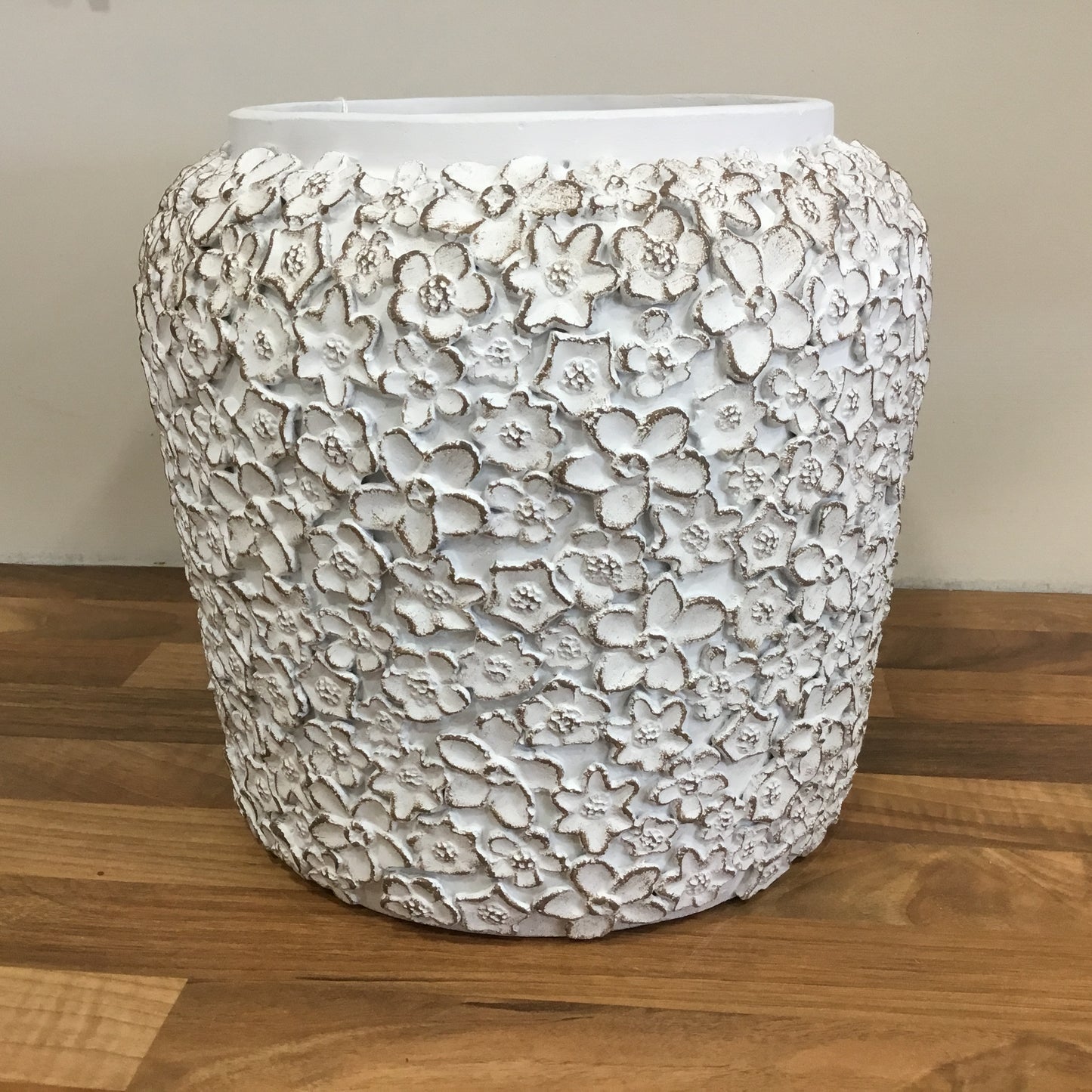 Rustic floral embossed stone vase