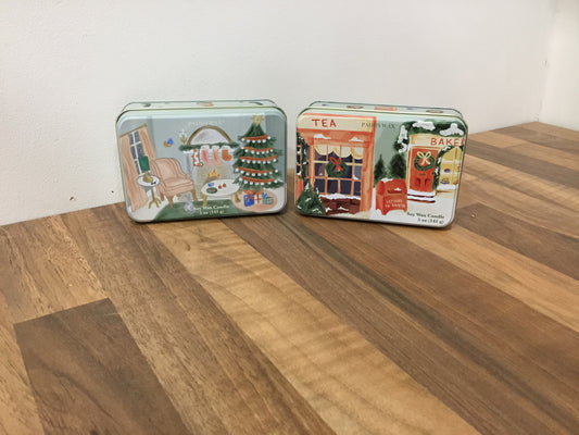 Christmas candles in a tin. Two scents available.