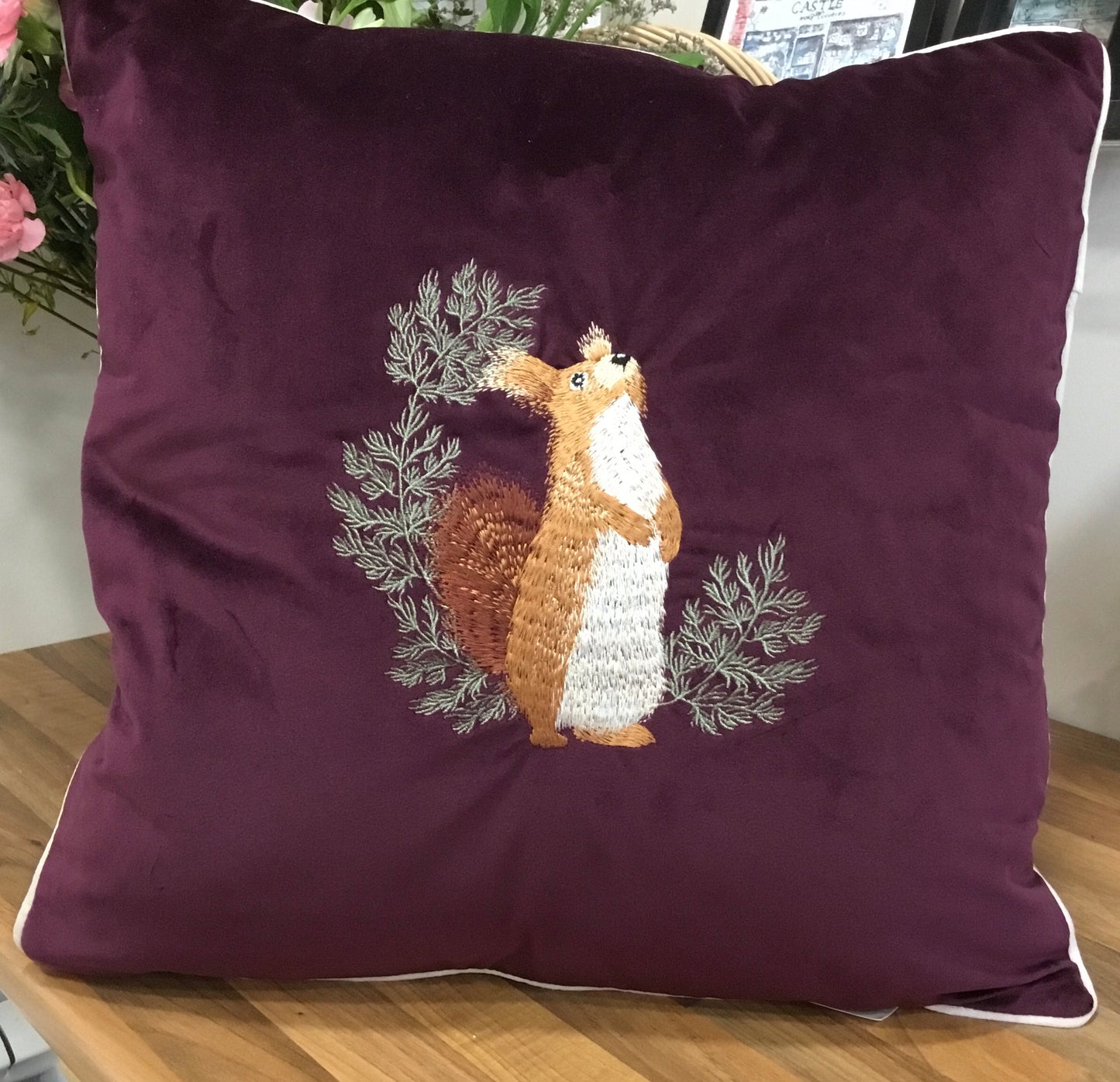 Plum velvet squirrel cushion