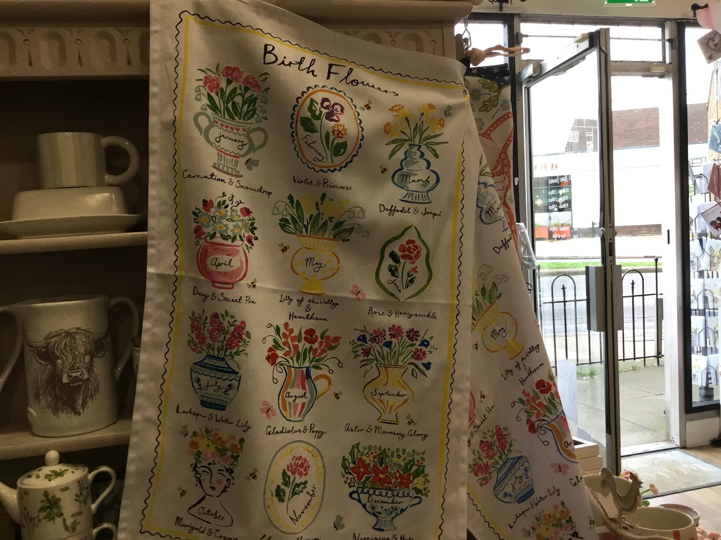 Ulster Weavers tea towel. Birth flowers design