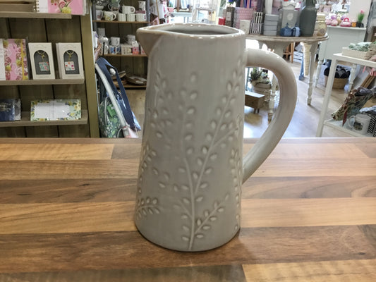 White ceramic leaf design jug
