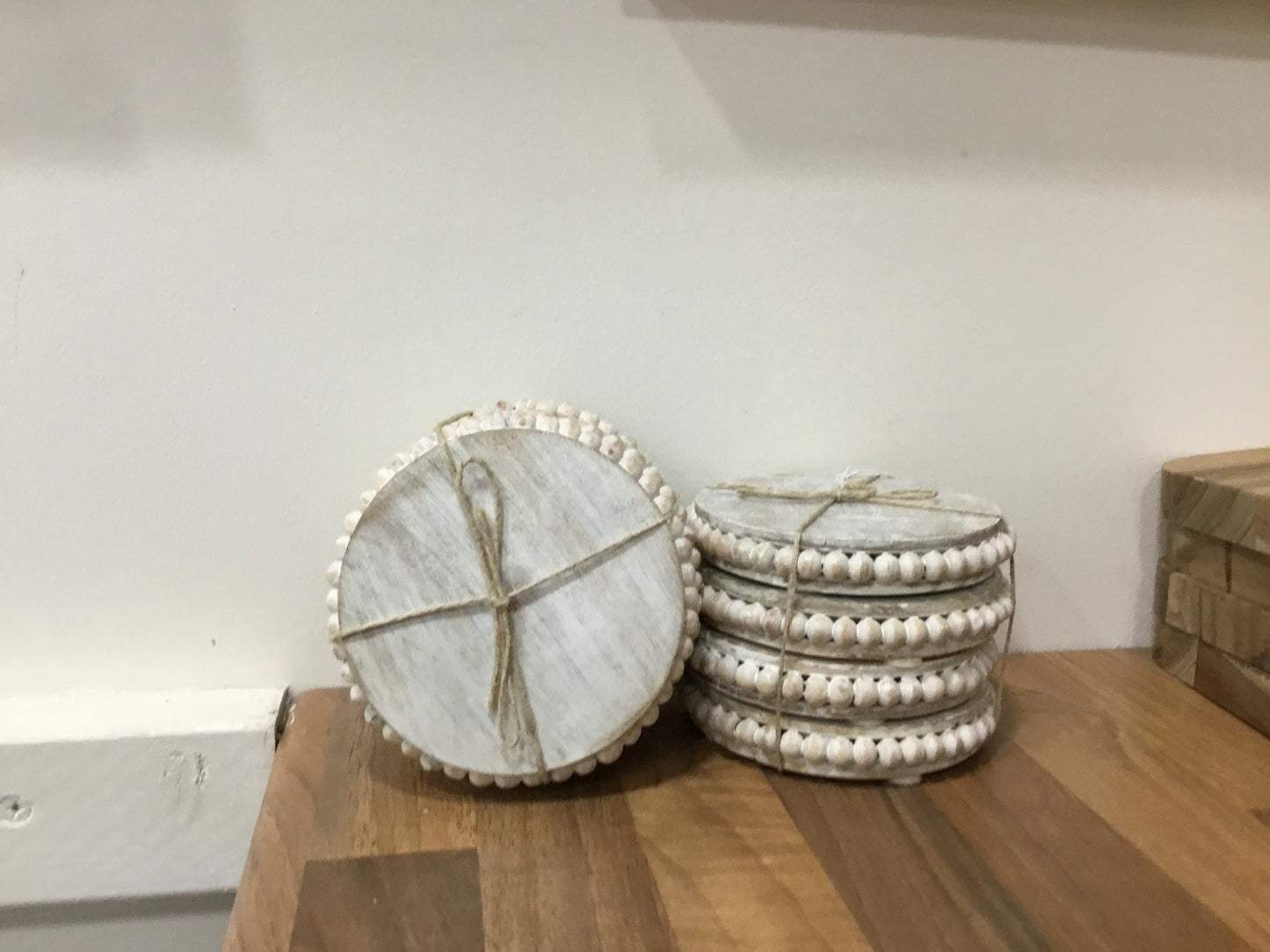 Wooden beaded coasters. Set of four