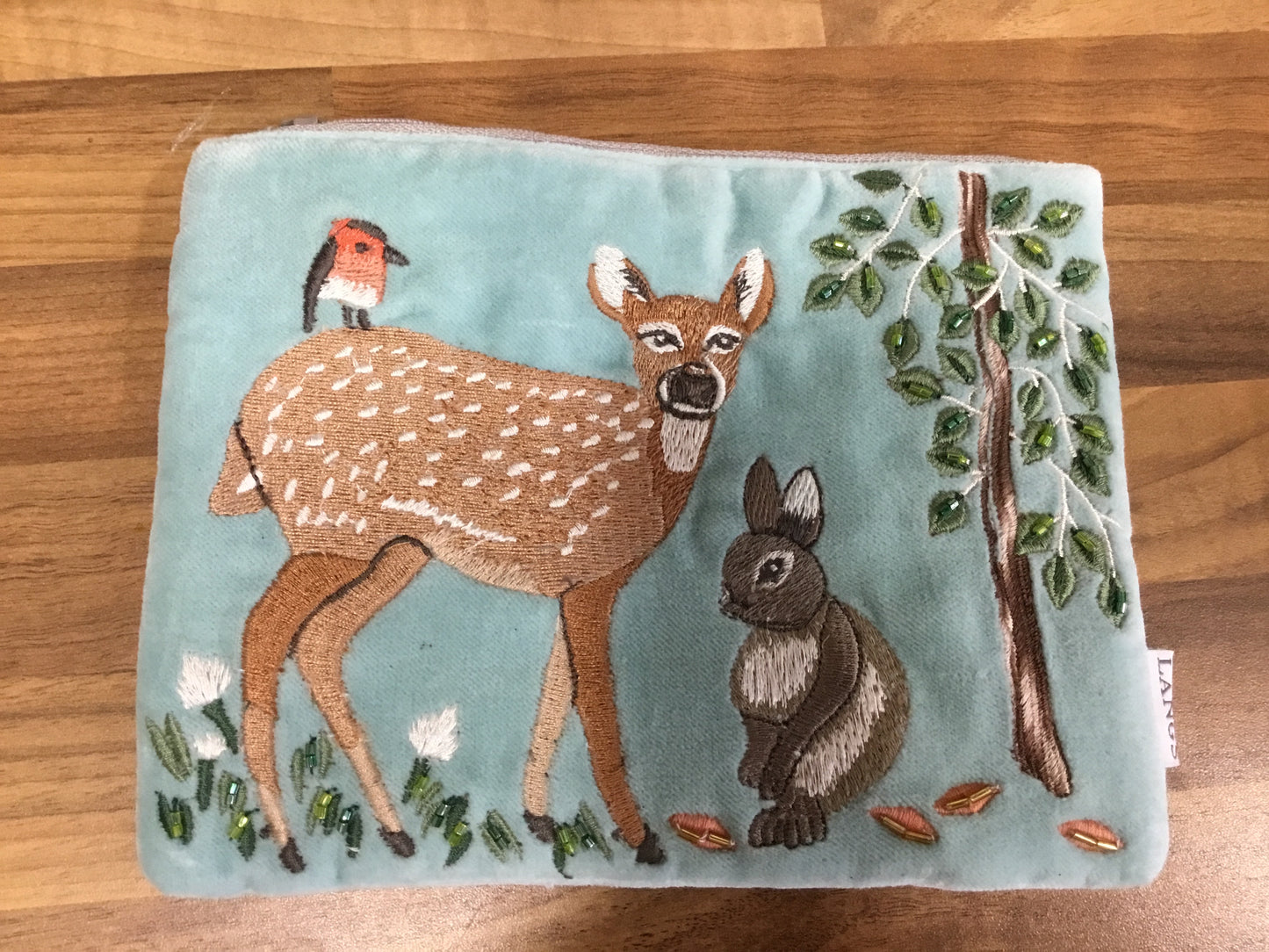Embroidered velvet pouch