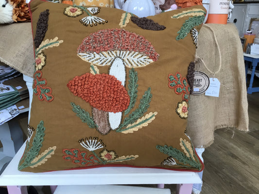 Feather filled embroiled cushion by Wylder