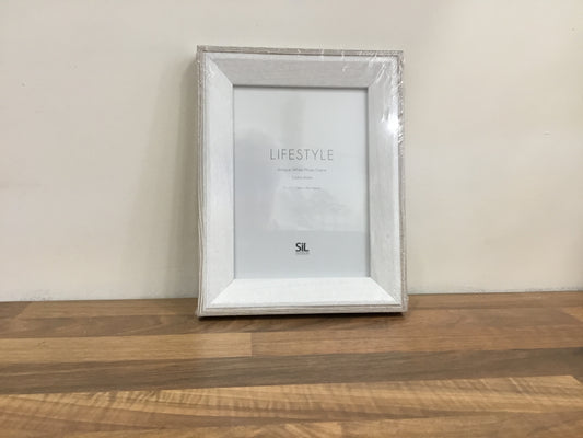 White frame. 13cmx18cm