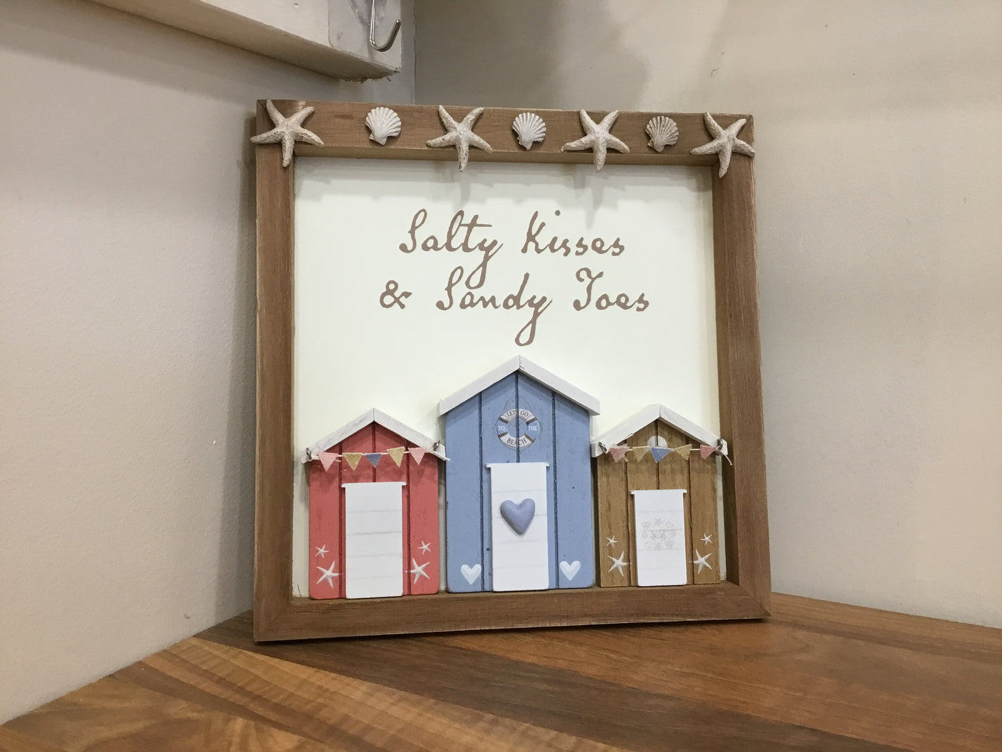 Plaque. Salty kisses and sandy toes.