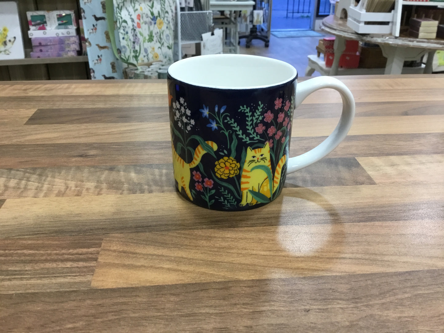 Ulster weavers. Marmalade meadow mug.