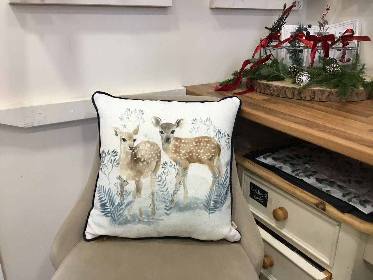 Blue winter fawns cushion.