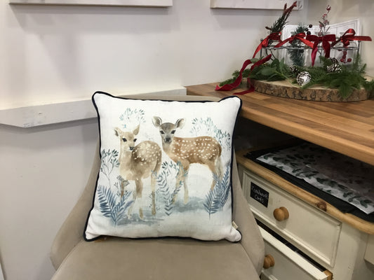 Blue winter fawns cushion.