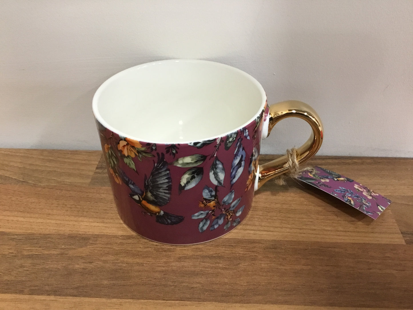 Bird mug with gold handle