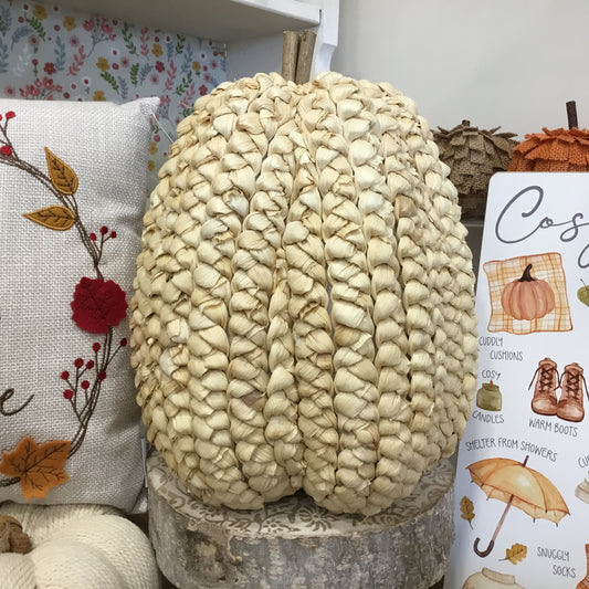 Tall straw pumpkin