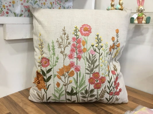 Embroidered floral cushion