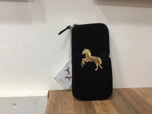 Elizabeth Scarlett. Glass case black velvet. Wild horse.